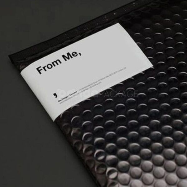 Black Bubble Mailer with Yellow Label for Stylish Shipping