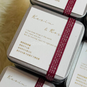 square silver tin box with decorative ribbon and customizable cover