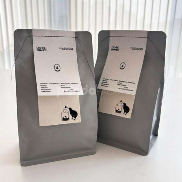 Modern Stand Up Coffee Pouch with Sewn Flavor Label