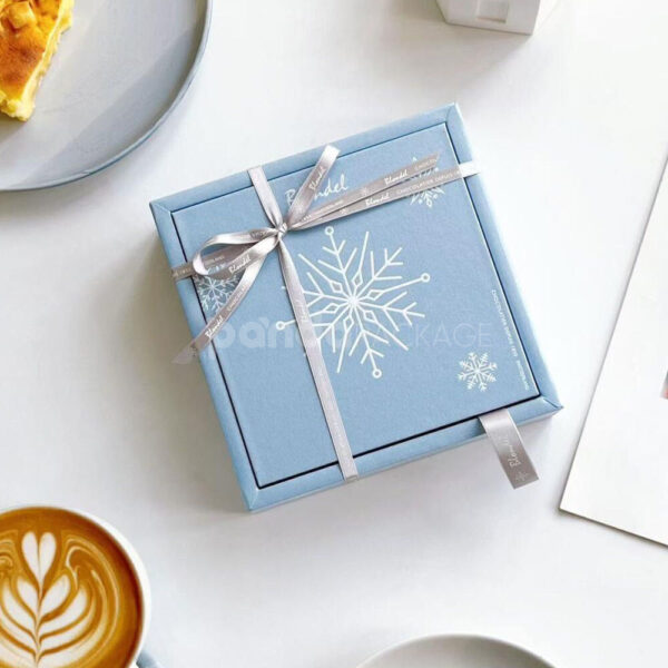 Elegant Blue Snowflake Chocolate Gift Box with Ribbon Closure