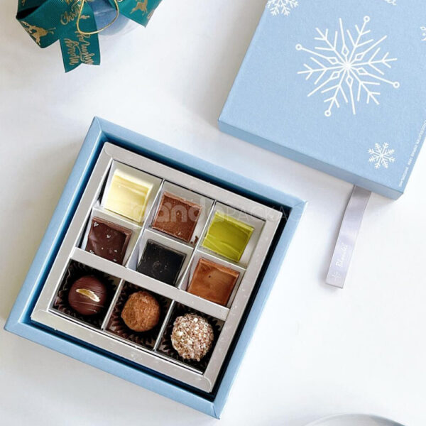 Elegant Blue Snowflake Chocolate Gift Box with Ribbon Closure