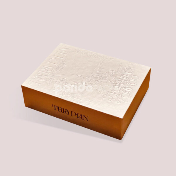 Elegant Media Package with Embossed Design and Bold Typography