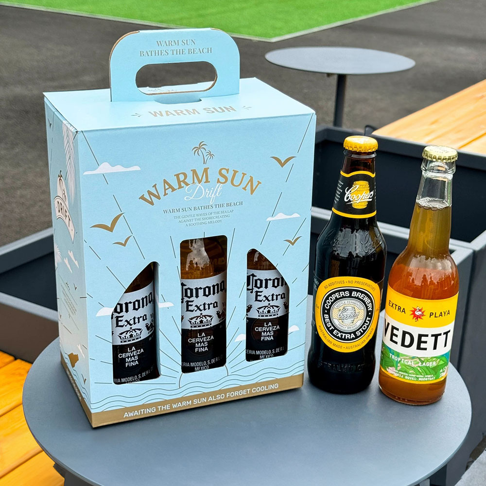 light blue six-bottle paperboard beer and liquor carrier box