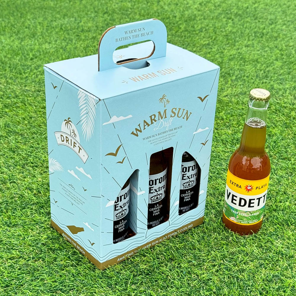 light blue six-bottle paperboard beer and liquor carrier box