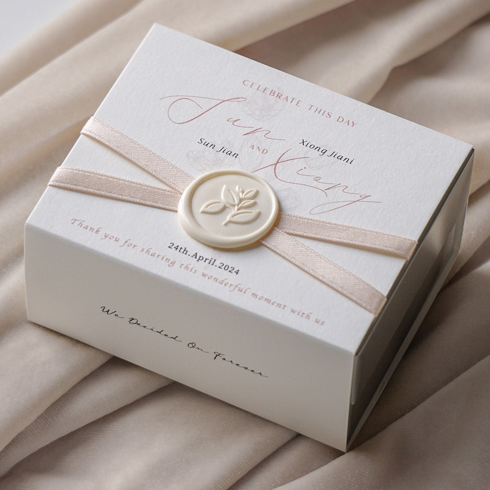 elegant white paperboard gift box with ribbon for wedding candy packaging