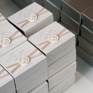 elegant white paperboard gift box with ribbon for wedding candy packaging