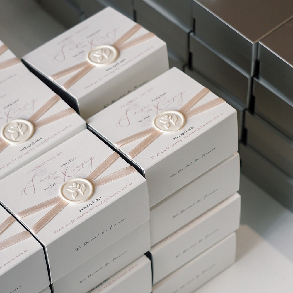 elegant white paperboard gift box with ribbon for wedding candy packaging