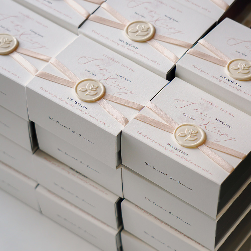 elegant white paperboard gift box with ribbon for wedding candy packaging