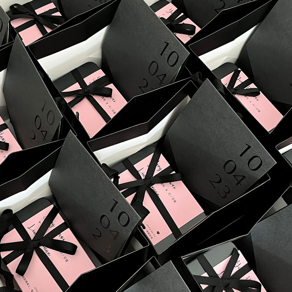 pink rectangular tin gift box with black ribbon for candy packaging