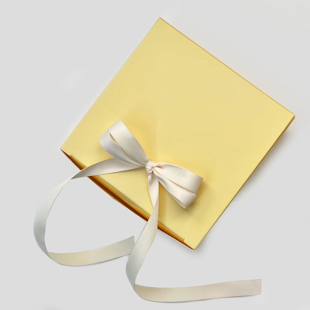 yellow paperboard gift box with satin ribbon for candy packaging