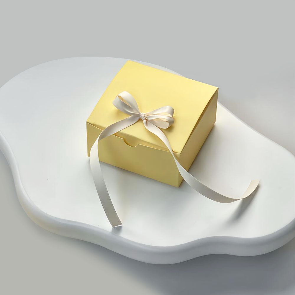 yellow paperboard gift box with satin ribbon for candy packaging