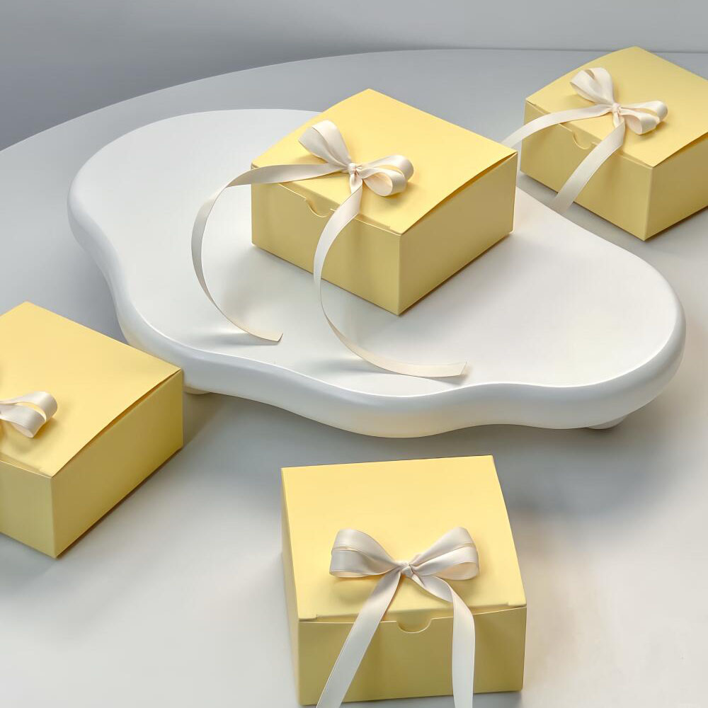 yellow paperboard gift box with satin ribbon for candy packaging