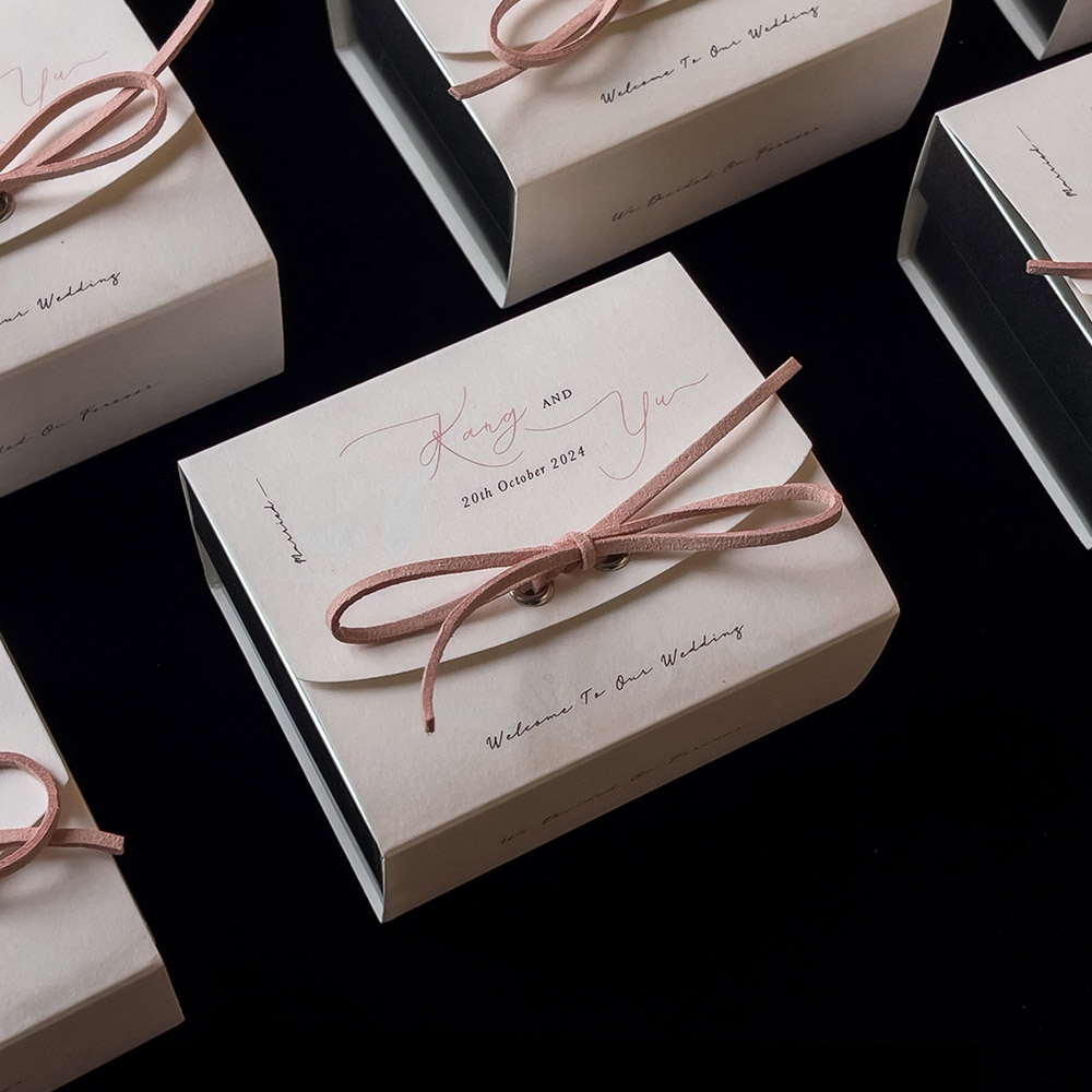 ivory wedding candy box with rose suede cord closure