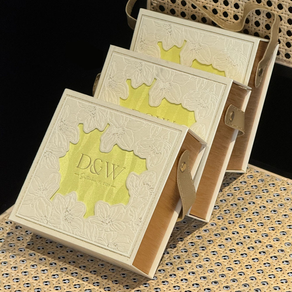rigid paperboard candy gift box with embossed floral pattern