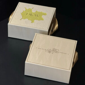 rigid paperboard candy gift box with embossed floral pattern