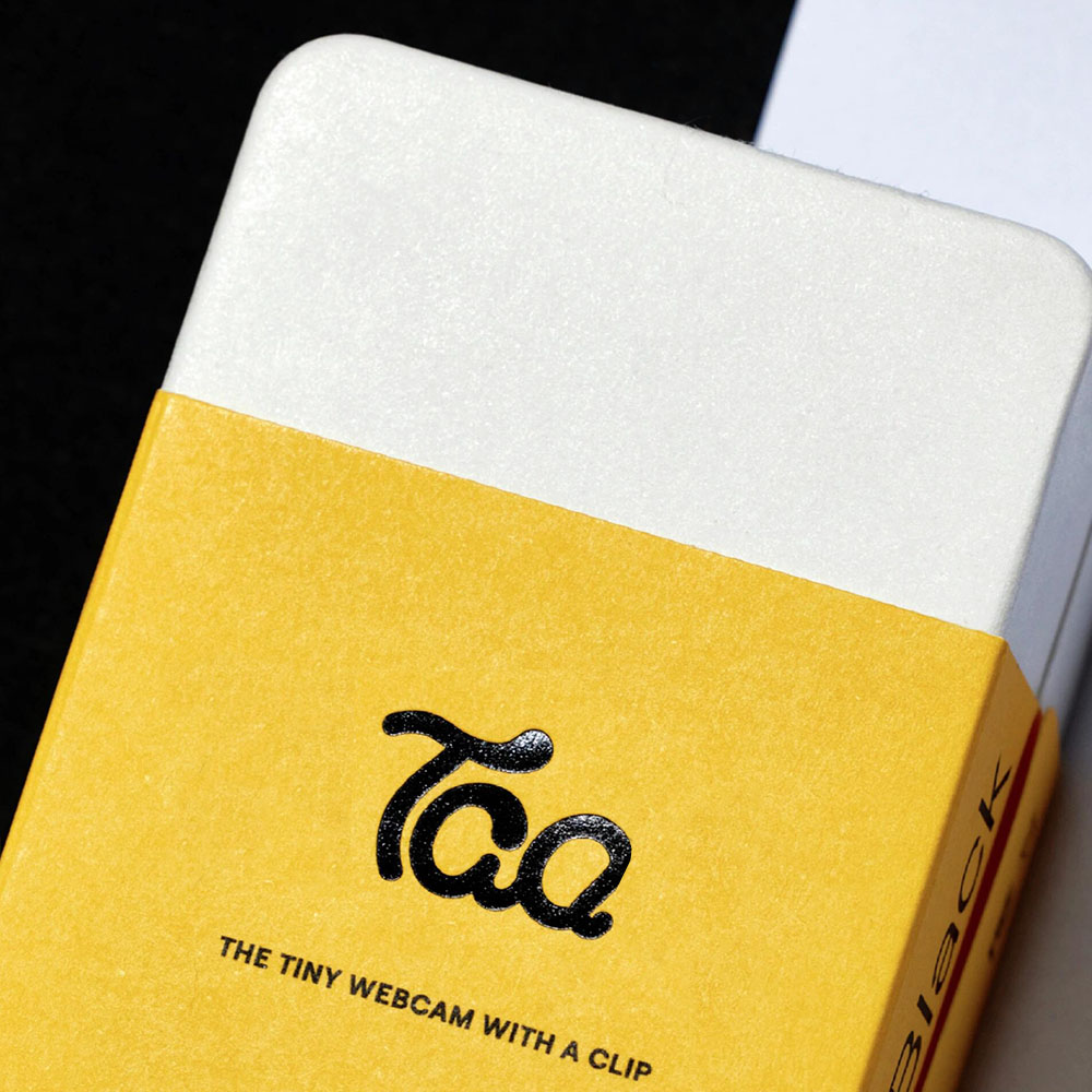 white rigid box with yellow sleeve for compact electronic devices