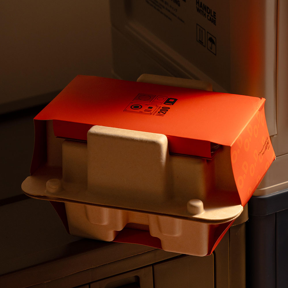 eco-friendly molded pulp electronic packaging with printed sleeve
