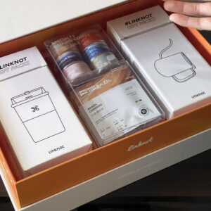 magnetic rigid paperboard gift box with flip-top lid and dividers