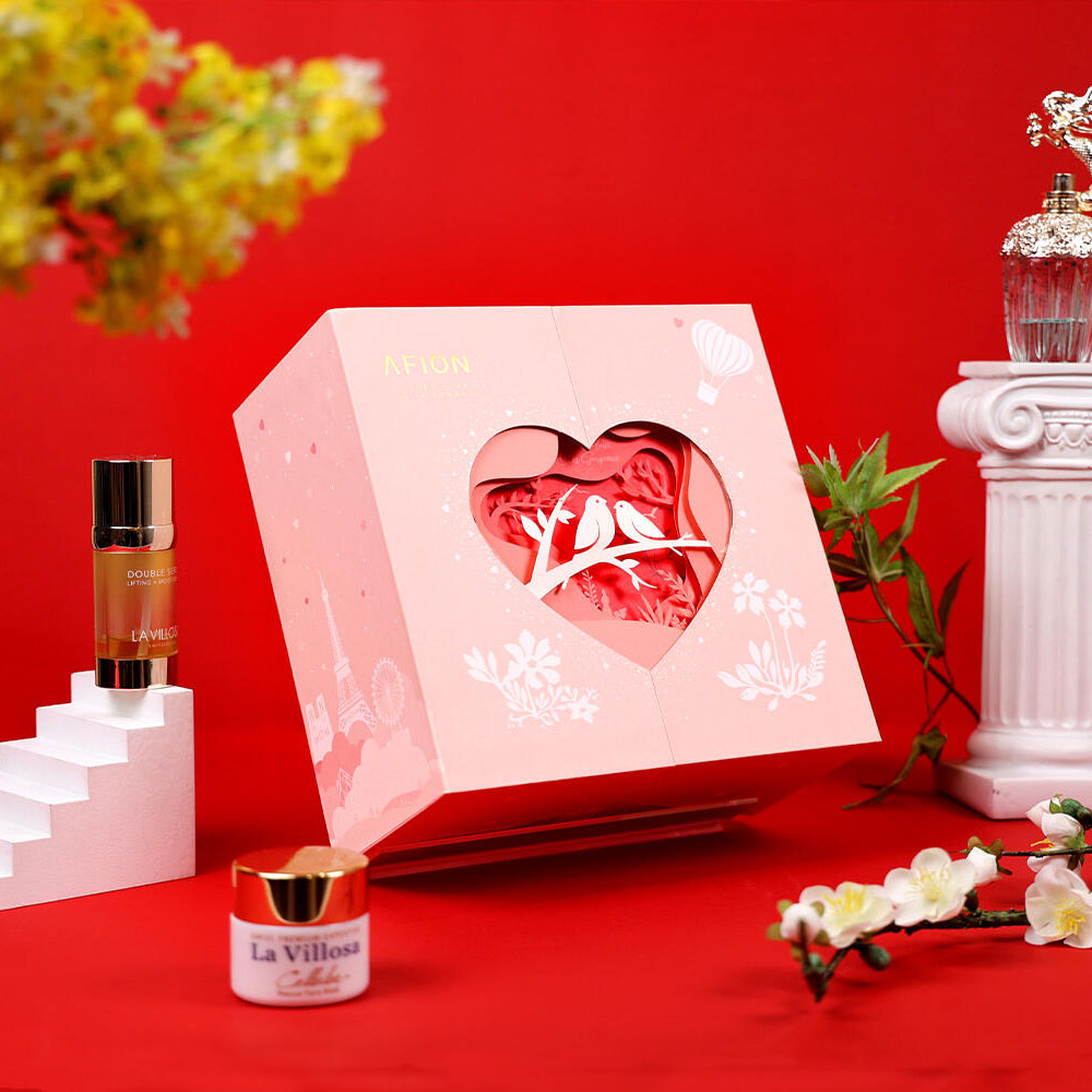 pink rigid gift box with heart shaped window and 3D paper cut design for luxury packaging