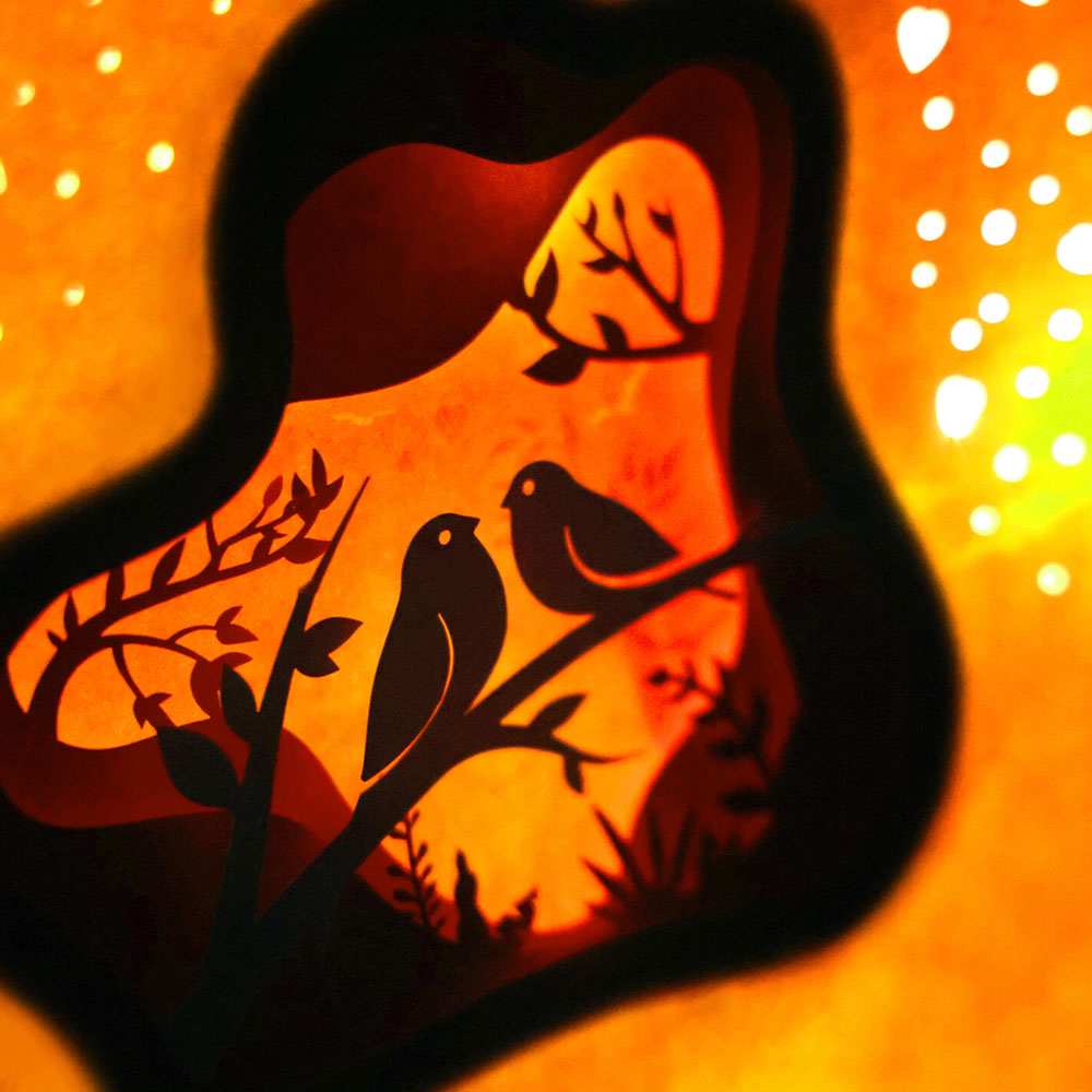 pink rigid gift box with heart shaped window and 3D paper cut design for luxury packaging