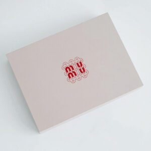 pink rigid paperboard gift box with flip lid and custom compartments for festive gift packaging