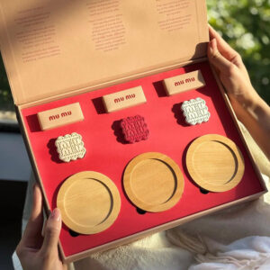 pink rigid paperboard gift box with flip lid and custom compartments for festive gift packaging