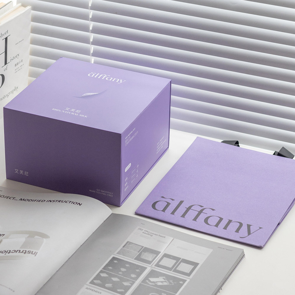 purple magnetic rigid gift box with flip lid and compartment insert for skincare mask and beauty gift packaging