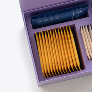purple magnetic rigid gift box with flip lid and compartment insert for skincare mask and beauty gift packaging