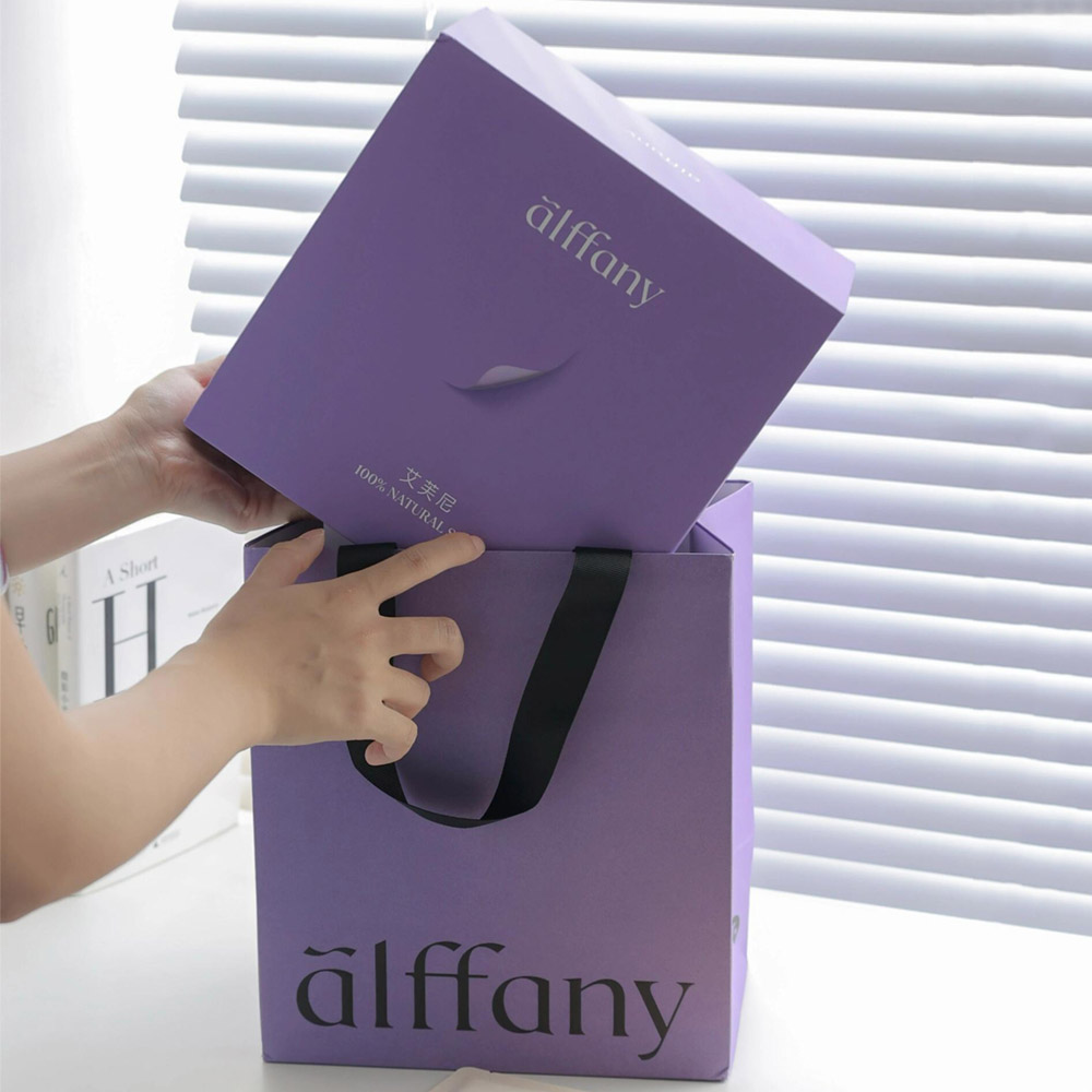 purple magnetic rigid gift box with flip lid and compartment insert for skincare mask and beauty gift packaging