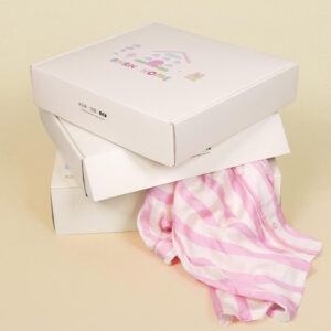 yellow folding mailer gift package box with flip lid and printed interior for clothing and lifestyle gift packaging