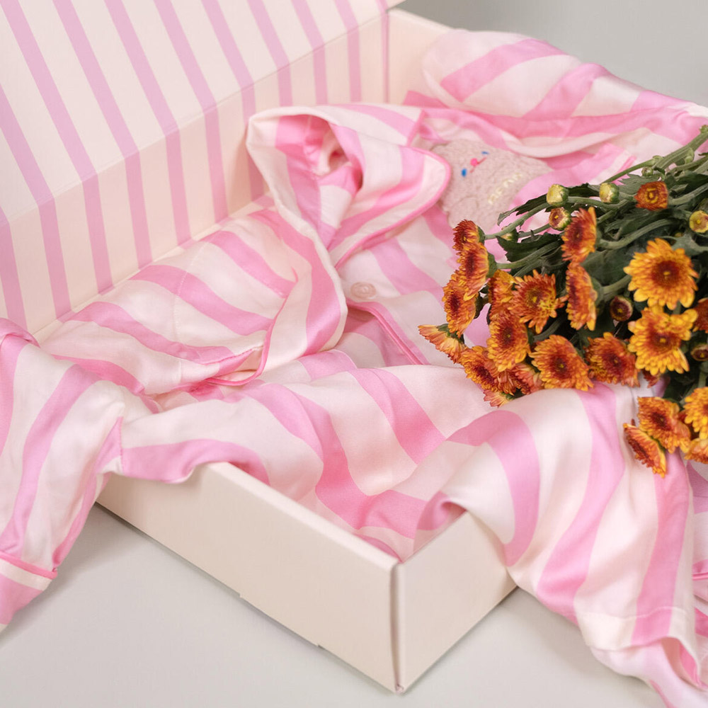 yellow folding mailer gift package box with flip lid and printed interior for clothing and lifestyle gift packaging