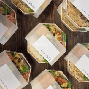 biodegradable wooden bento box with compartments and clear lid