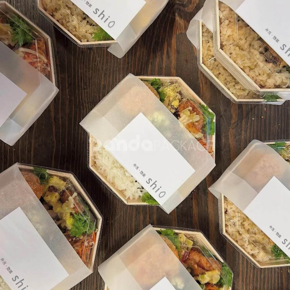 biodegradable wooden bento box with compartments and clear lid