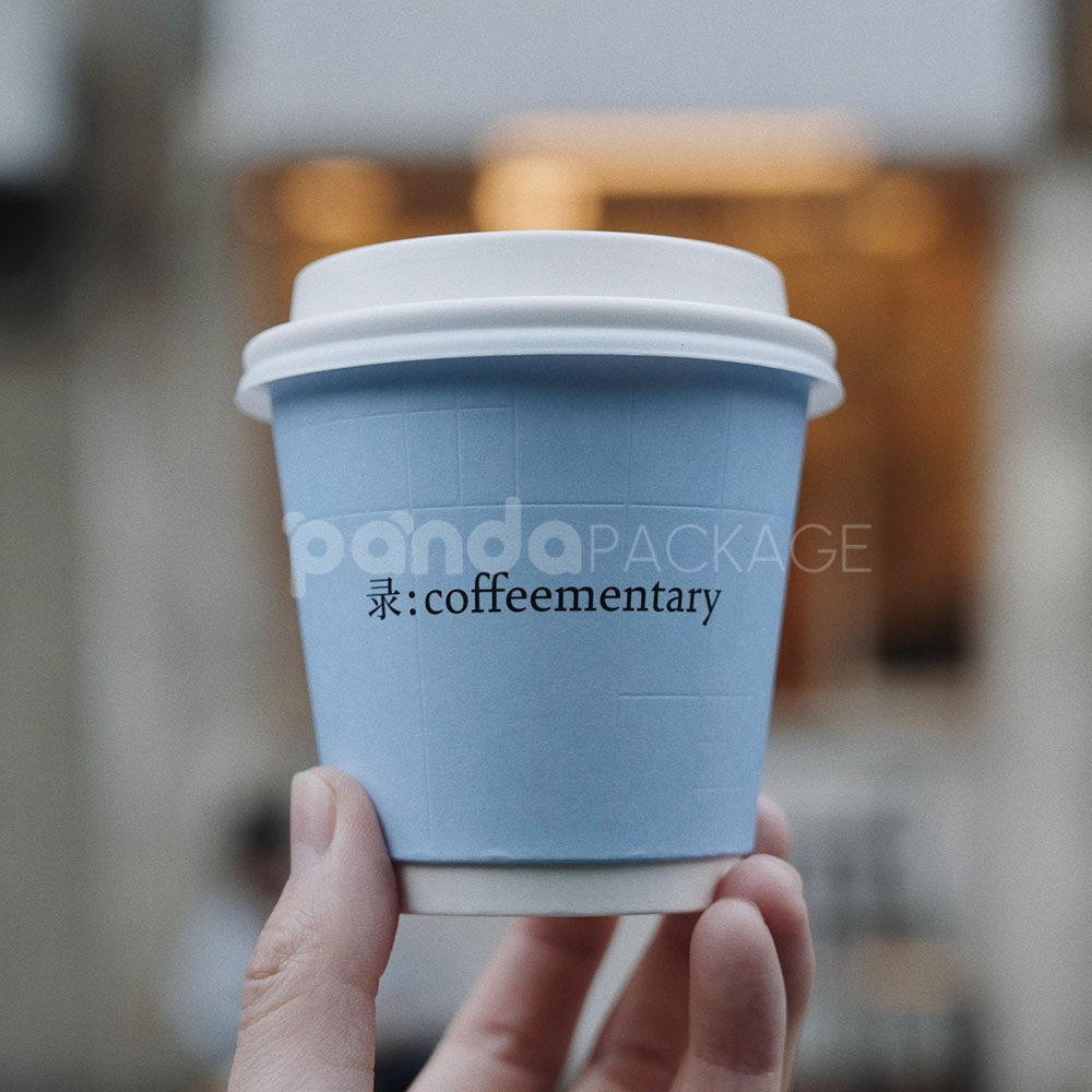 printed disposable coffee paper cup with white lid for takeaway drinks and cafes
