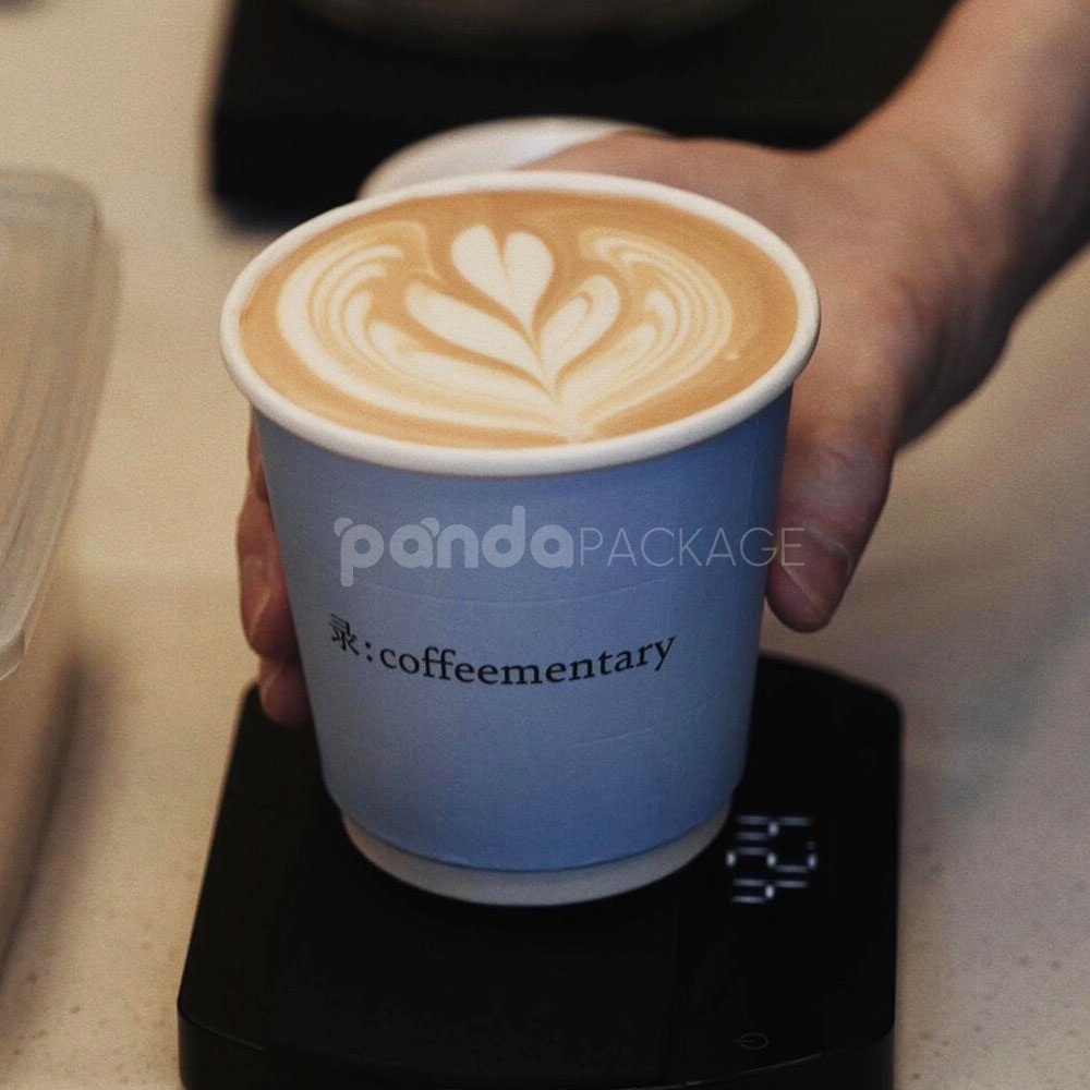 printed disposable coffee paper cup with white lid for takeaway drinks and cafes