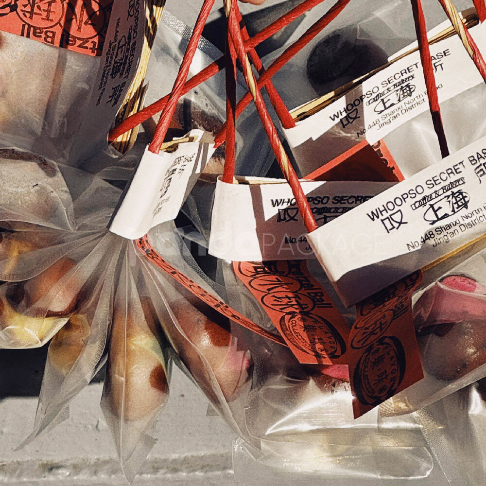 clear hanging bakery bag with paper header and rope handle for food packaging