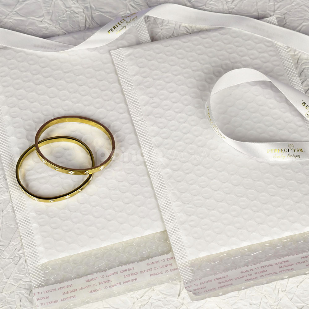 white bubble mailer bags with printed logo for jewelry, cosmetics and gift packaging