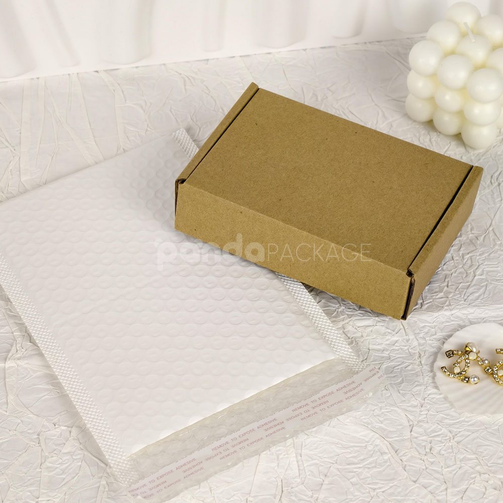 white bubble mailer bags with printed logo for jewelry, cosmetics and gift packaging