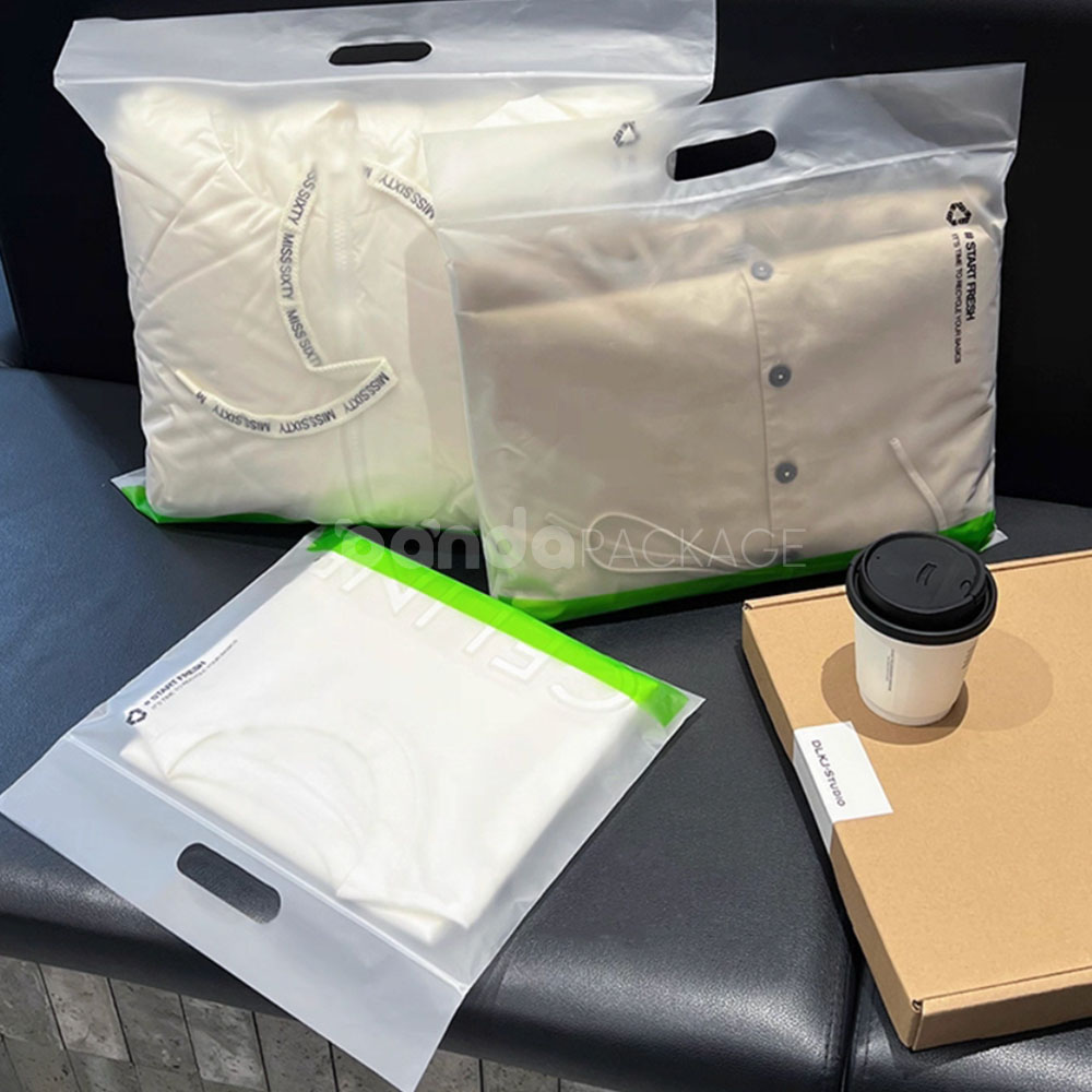frosted zip lock clothing packaging bags with die-cut handle for apparel retail and shipping