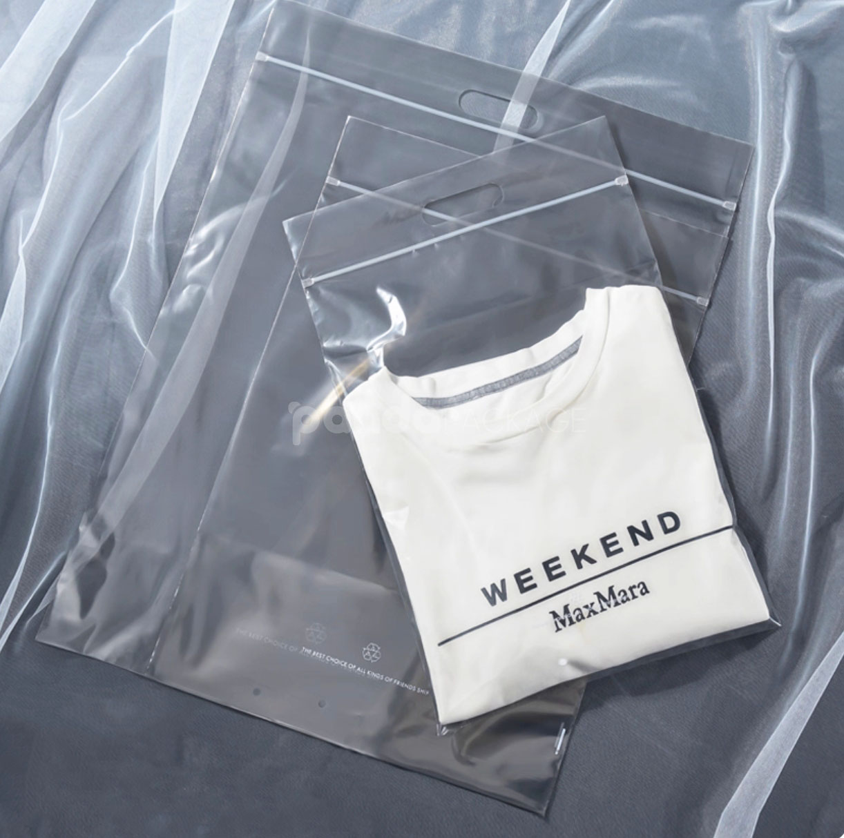 transparent zip lock apparel packaging bags in multiple colors with die-cut handle