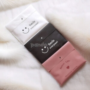 non-woven dustproof clothing packaging bags in black white and pink for apparel retail and storage