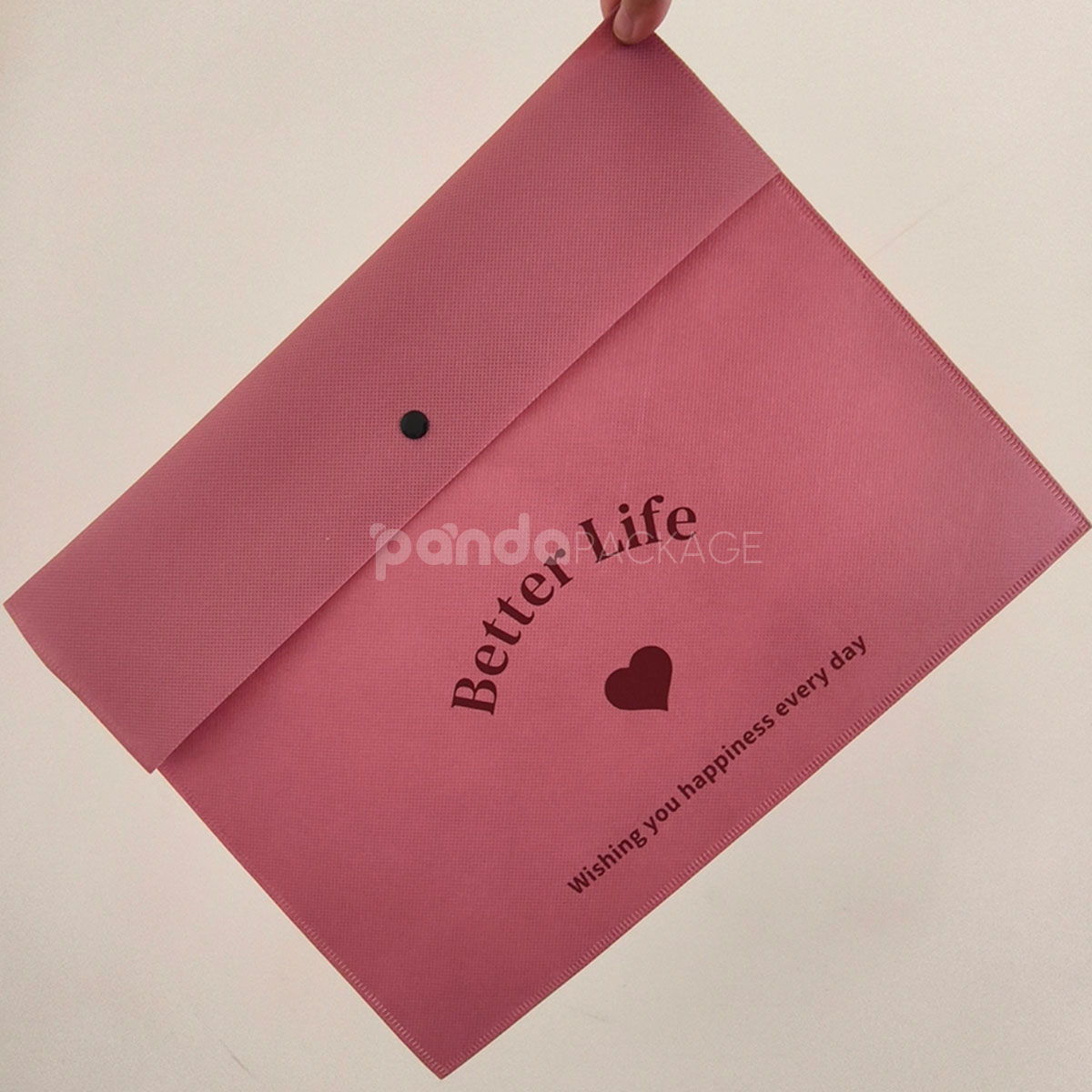 non-woven dustproof clothing packaging bags in black white and pink for apparel retail and storage