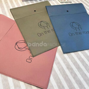 non-woven dustproof clothing packaging bags in black white and pink for apparel retail and storage