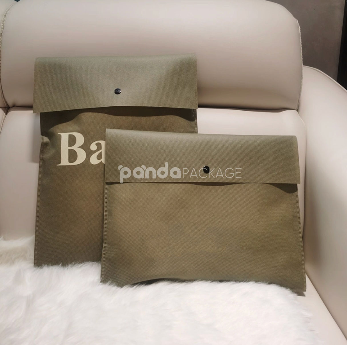 non-woven dustproof clothing packaging bags in black white and pink for apparel retail and storage