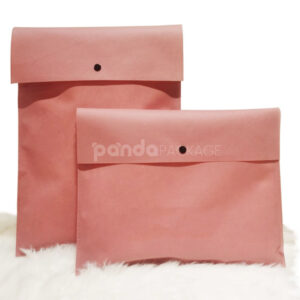 non-woven dustproof clothing packaging bags in black white and pink for apparel retail and storage
