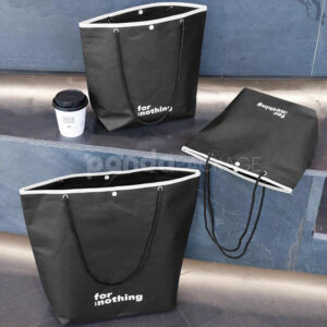 tapered non-woven tote bags with rope handles and piping edges, available in multiple colors and custom sizes for apparel packaging