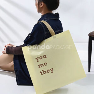 minimalist non-woven tote bags with reinforced handles and printed design, available in multiple colors and custom sizes for apparel and retail packaging