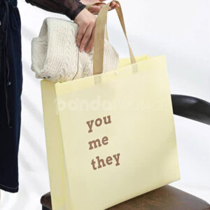 minimalist non-woven tote bags with reinforced handles and printed design, available in multiple colors and custom sizes for apparel and retail packaging