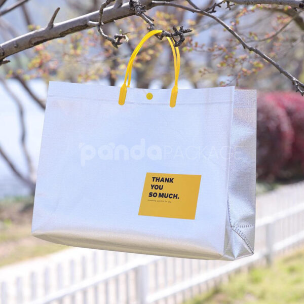 Silver Foil Non-Woven Tote Bags with Fabric or Plastic Handles for Apparel and Gift Packaging