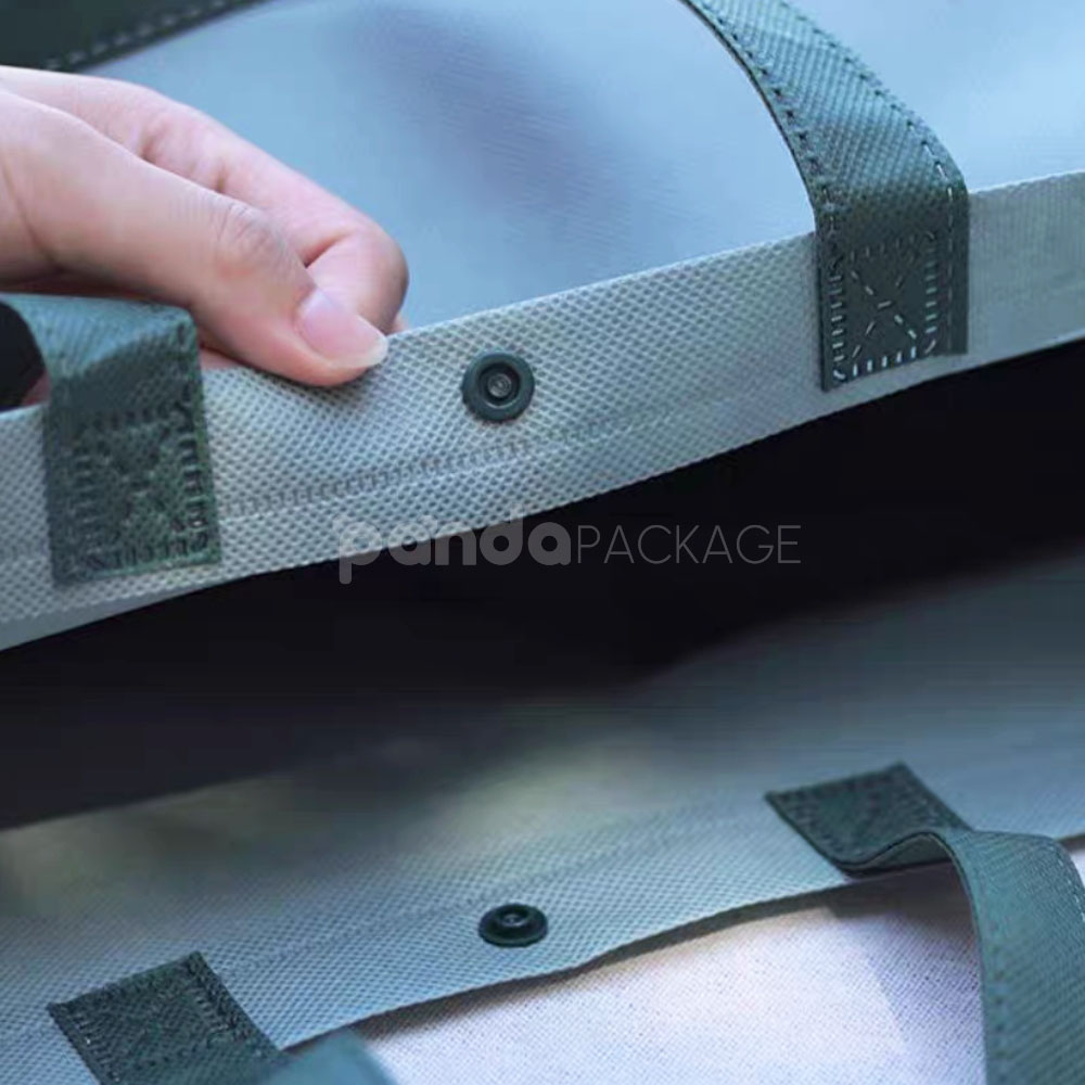 thickened non-woven tote bags with reinforced handles and snap button closure, custom printed for apparel and retail packaging